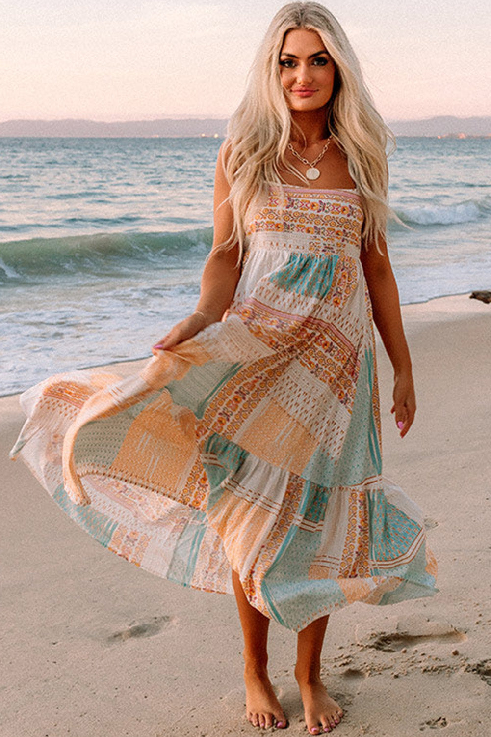 Multicolor Boho Patchwork Print Square Neck SundressMaterial:100%Polyester
Bohemian-inspired sundress with a colorful patchwork print and square neckline.
Flowy and comfortable midi dress with a loose