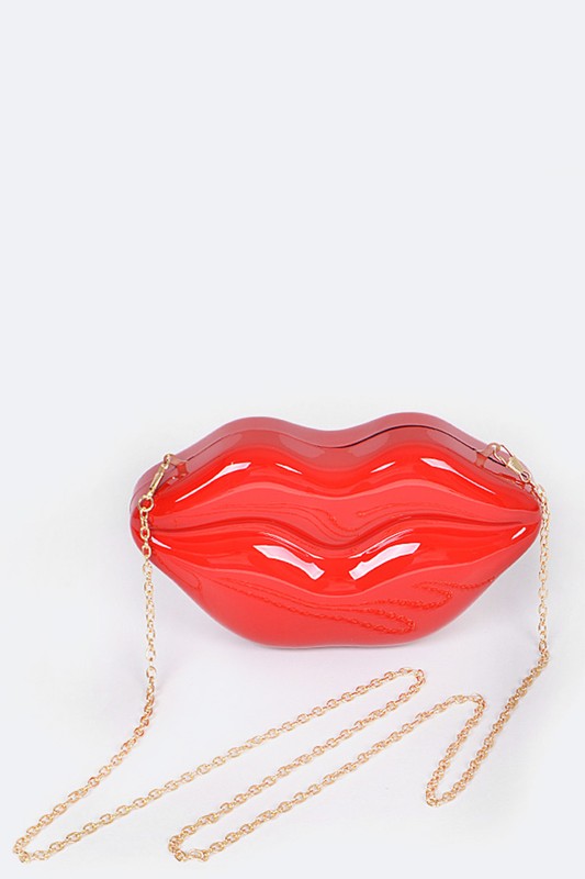 Lips Clutch BagLength - 8.5" Width - 2.25" Height - 4.5" Shoulder Chain Included Composition - Polyurethane & Mix Metals Lead & Nickel Compliant