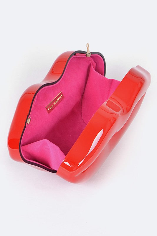 Lips Clutch BagLength - 8.5" Width - 2.25" Height - 4.5" Shoulder Chain Included Composition - Polyurethane & Mix Metals Lead & Nickel Compliant