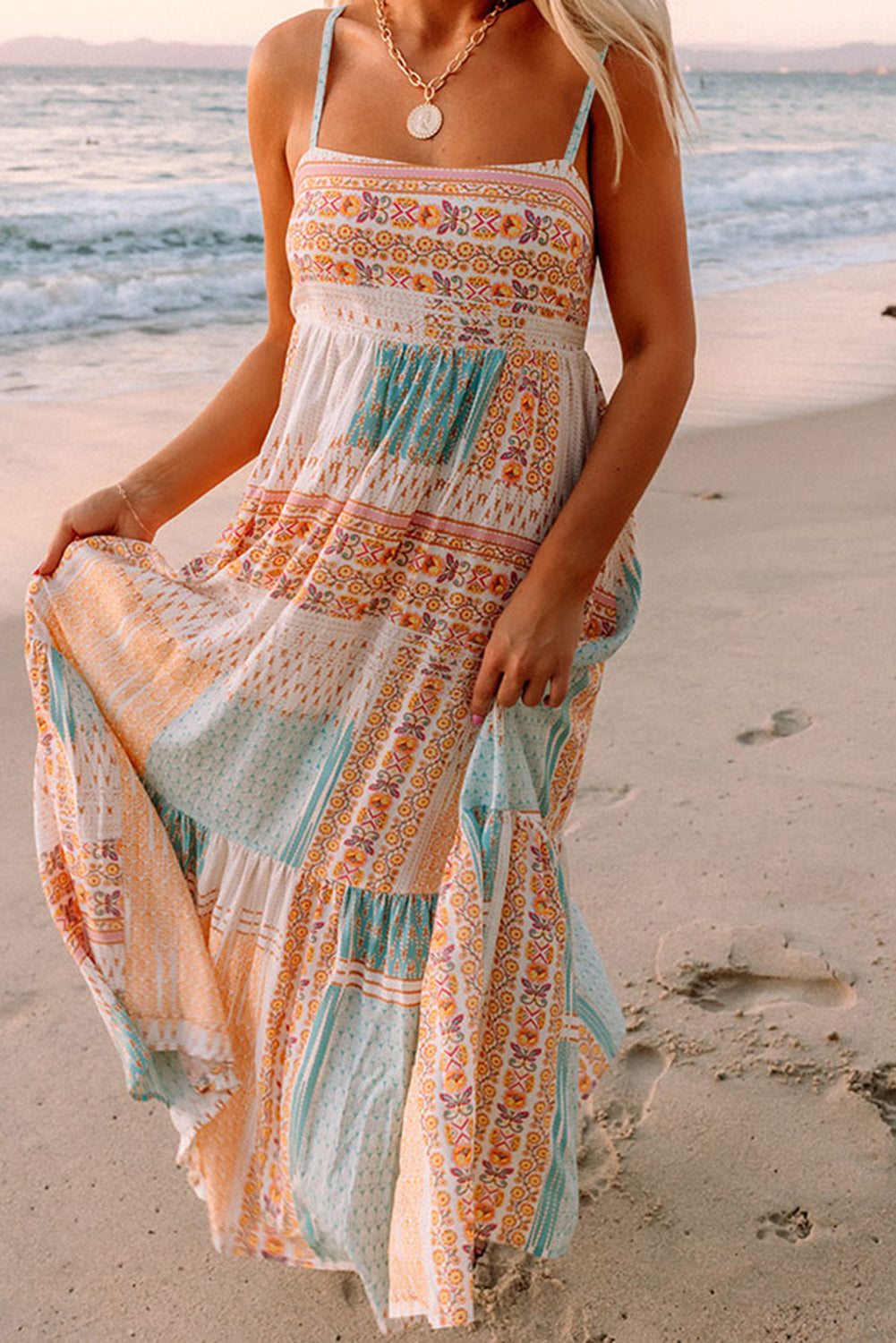 Multicolor Boho Patchwork Print Square Neck SundressMaterial:100%Polyester
Bohemian-inspired sundress with a colorful patchwork print and square neckline.
Flowy and comfortable midi dress with a loose