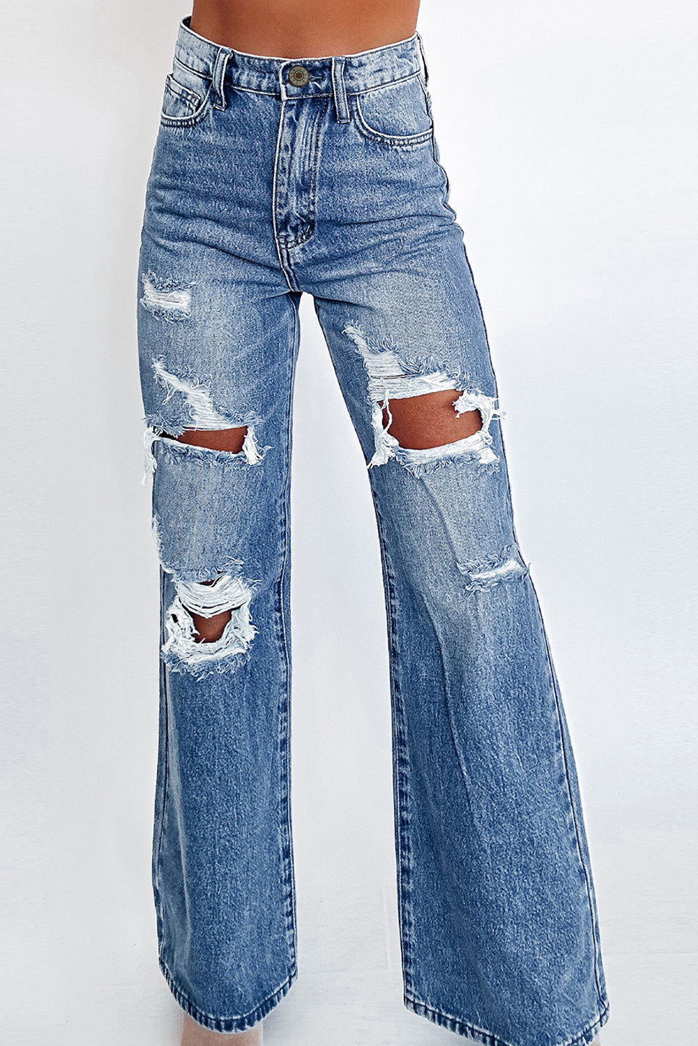 Ashleigh Blue Acid Wash Distressed Wide Leg High Waist JeansMaterial:93%Cotton+5%polyester+2%Elastane
• Distressed wide-leg jeans in a unique acid wash, perfect for a vintage look with a modern twist.
• High-waisted design