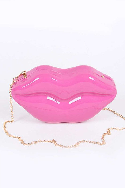 Lips Clutch BagLength - 8.5" Width - 2.25" Height - 4.5" Shoulder Chain Included Composition - Polyurethane & Mix Metals Lead & Nickel Compliant
