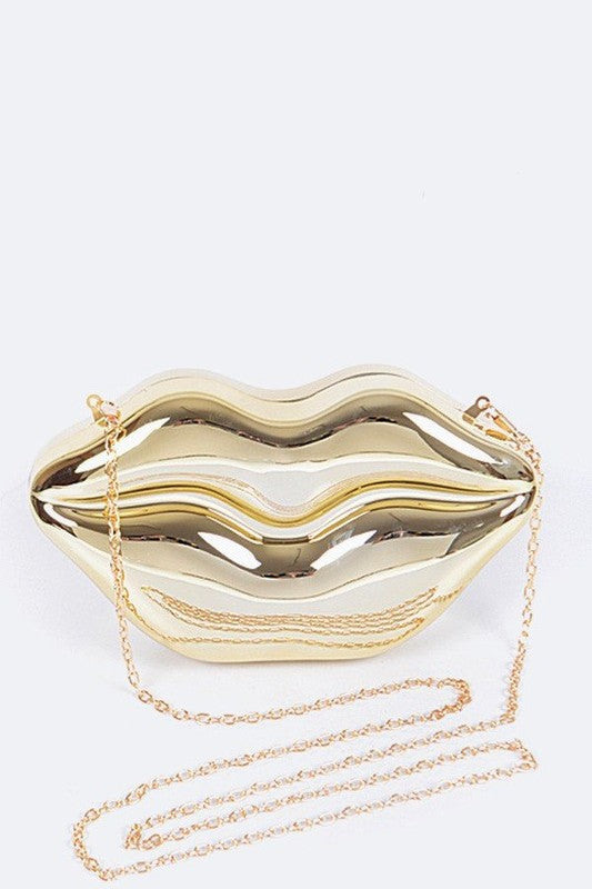 Lips Clutch BagLength - 8.5" Width - 2.25" Height - 4.5" Shoulder Chain Included Composition - Polyurethane & Mix Metals Lead & Nickel Compliant