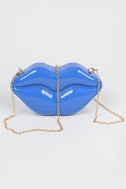 Lips Clutch BagLength - 8.5" Width - 2.25" Height - 4.5" Shoulder Chain Included Composition - Polyurethane & Mix Metals Lead & Nickel Compliant