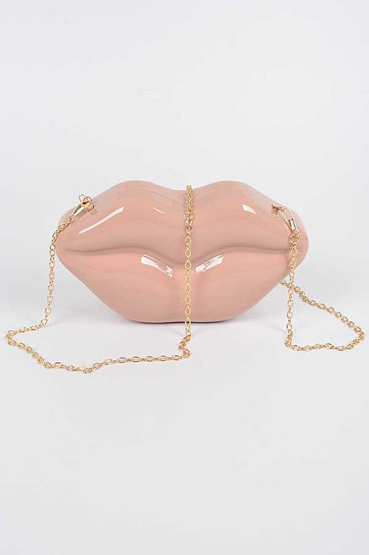 Lips Clutch BagLength - 8.5" Width - 2.25" Height - 4.5" Shoulder Chain Included Composition - Polyurethane & Mix Metals Lead & Nickel Compliant