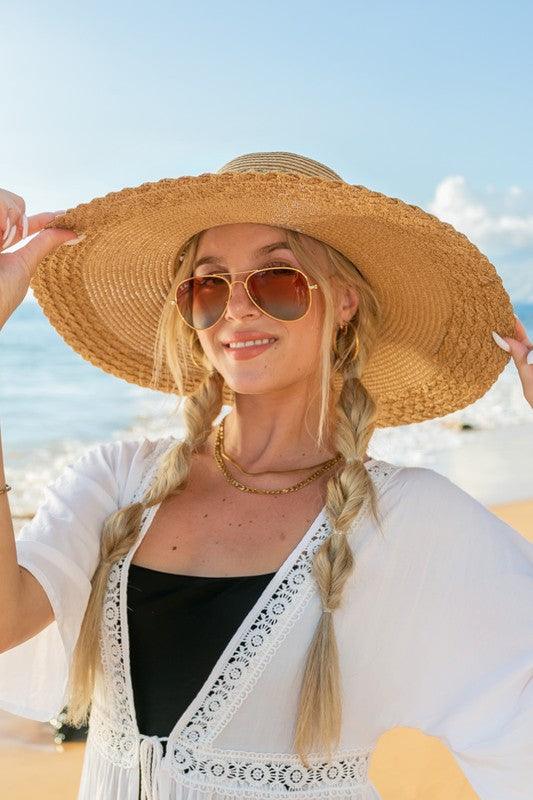 Scallop Edge Bow Accent SunhatScallop Edge Bow Accent Sunhat DetailsScallop edge designBurlap bow accentHat material: 100% strawBrim length: 5.5"Foldable & packableInside lining for all-day c