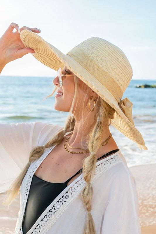 Scallop Edge Bow Accent SunhatScallop Edge Bow Accent Sunhat DetailsScallop edge designBurlap bow accentHat material: 100% strawBrim length: 5.5"Foldable & packableInside lining for all-day c