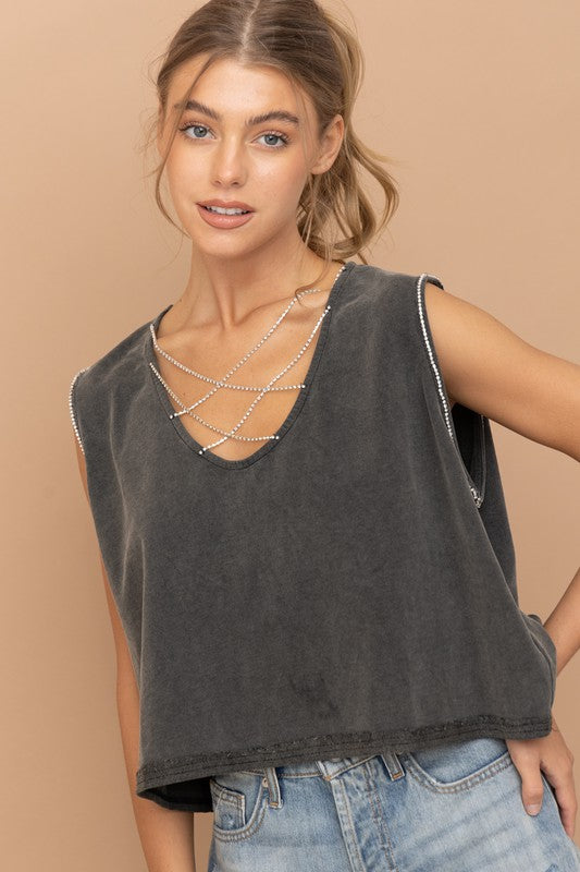 Mineral Washed Rhinestone TankIntroducing our Mineral Washed Rhinestone Tank, the epitome of edgy elegance. Crafted from French terry fabric with a unique mineral wash finish, this tank exudes ef