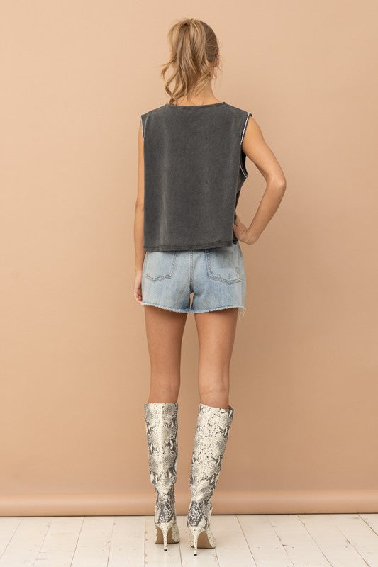Mineral Washed Rhinestone TankIntroducing our Mineral Washed Rhinestone Tank, the epitome of edgy elegance. Crafted from French terry fabric with a unique mineral wash finish, this tank exudes ef