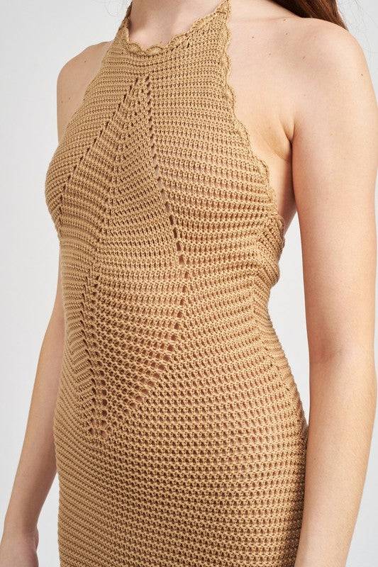 CROCHET HALTER MIDI DRESS WITH SLITSIZE & FIT :MODEL WEARS SIZE SMALLMODEL'S HEIGHT 5'9Made In: IMPORTEDFabric Contents: 55% ACRYLIC, 45% COTTON