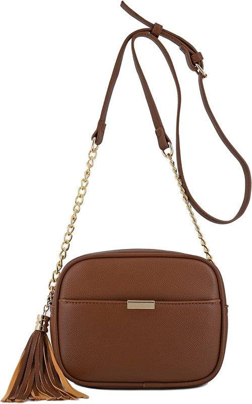 Tassel Small Crossbody Bag Camera BagTassel Small Crossbody Bag Camera Bag 8.75" (W) x 6.5" (H) x 3.25" (D) Tassel zipper Closure Adjustable Shoulder Strap with 22" min to 25" max drop Solid tone faux l