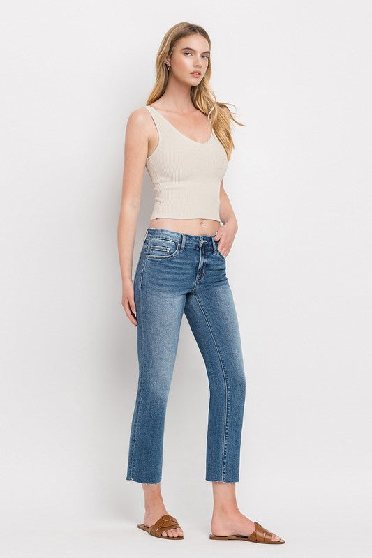 Mid Rise Crop Slim Straight JeansThe Mid Rise Crop Slim Straight Jeans offer a modern take on a classic silhouette. Made from stretch denim, these jeans provide both comfort and style. With a mid-ri