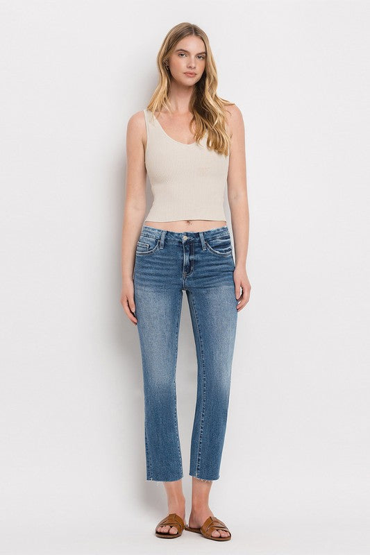 Mid Rise Crop Slim Straight JeansThe Mid Rise Crop Slim Straight Jeans offer a modern take on a classic silhouette. Made from stretch denim, these jeans provide both comfort and style. With a mid-ri