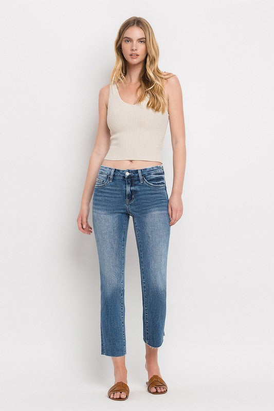Mid Rise Crop Slim Straight JeansThe Mid Rise Crop Slim Straight Jeans offer a modern take on a classic silhouette. Made from stretch denim, these jeans provide both comfort and style. With a mid-ri