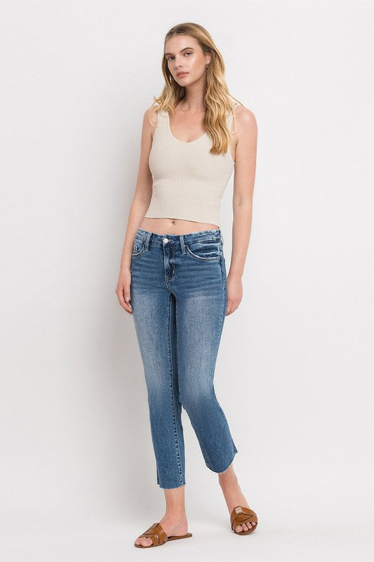 Mid Rise Crop Slim Straight JeansThe Mid Rise Crop Slim Straight Jeans offer a modern take on a classic silhouette. Made from stretch denim, these jeans provide both comfort and style. With a mid-ri