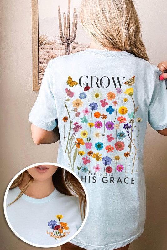 Wild Flowers Grow In Grace Graphic TeeWild Flowers Grow In Grace Front and Back Graphic Tee.Unisex Crew Neck Short Sleeve Tees.Crafted from premium materials, tailored to your lifestyle, ensuring a comfo