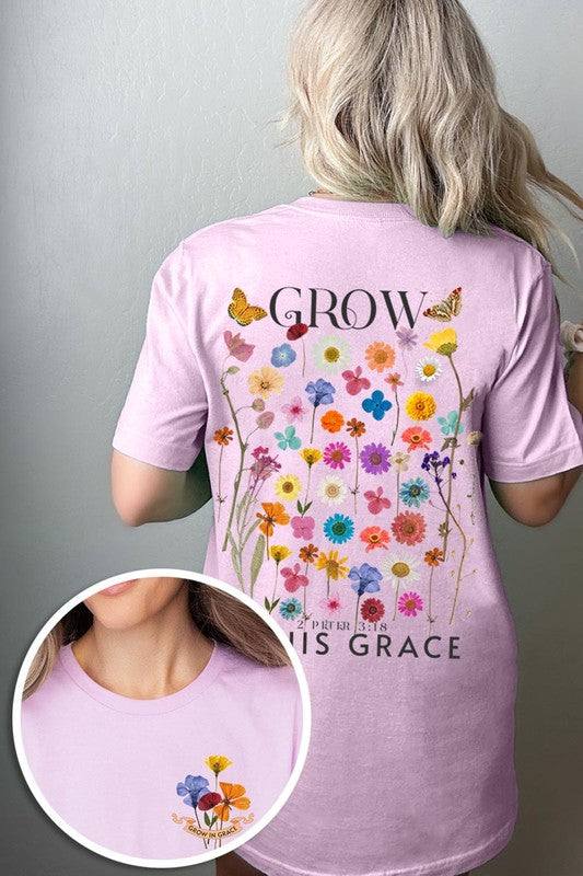 Wild Flowers Grow In Grace Graphic TeeWild Flowers Grow In Grace Front and Back Graphic Tee.Unisex Crew Neck Short Sleeve Tees.Crafted from premium materials, tailored to your lifestyle, ensuring a comfo