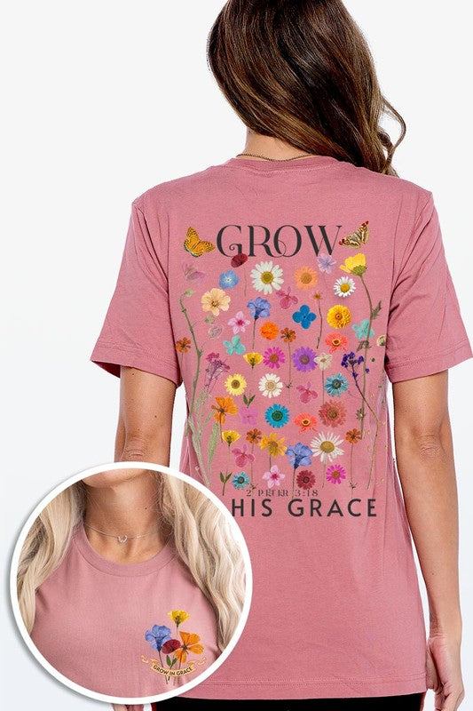 Wild Flowers Grow In Grace Graphic TeeWild Flowers Grow In Grace Front and Back Graphic Tee.Unisex Crew Neck Short Sleeve Tees.Crafted from premium materials, tailored to your lifestyle, ensuring a comfo