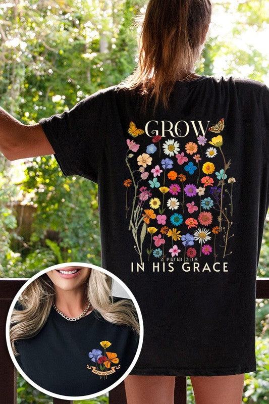 Wild Flowers Grow In Grace Graphic TeeWild Flowers Grow In Grace Front and Back Graphic Tee.Unisex Crew Neck Short Sleeve Tees.Crafted from premium materials, tailored to your lifestyle, ensuring a comfo