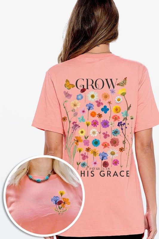 Wild Flowers Grow In Grace Graphic TeeWild Flowers Grow In Grace Front and Back Graphic Tee.Unisex Crew Neck Short Sleeve Tees.Crafted from premium materials, tailored to your lifestyle, ensuring a comfo