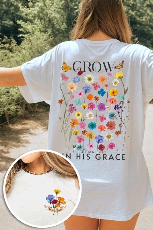 Wild Flowers Grow In Grace Graphic TeeWild Flowers Grow In Grace Front and Back Graphic Tee.Unisex Crew Neck Short Sleeve Tees.Crafted from premium materials, tailored to your lifestyle, ensuring a comfo
