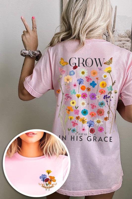 Wild Flowers Grow In Grace Graphic TeeWild Flowers Grow In Grace Front and Back Graphic Tee.Unisex Crew Neck Short Sleeve Tees.Crafted from premium materials, tailored to your lifestyle, ensuring a comfo