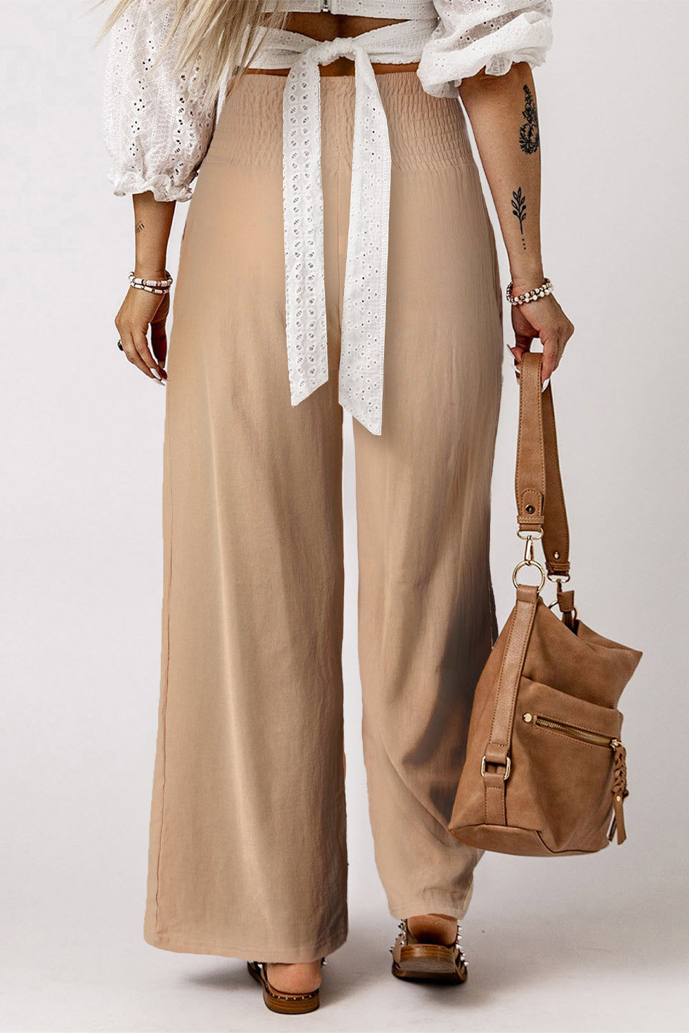 Black Smocked Wide Waistband High Waist Wide Leg PantsMaterial:65%COTTON+35%POLYESTER
Flattering smocked waistband cinches at the
waist for a lovely silhouette
High waist design elongates legs for a
st