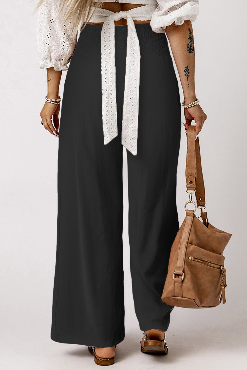Black Smocked Wide Waistband High Waist Wide Leg PantsMaterial:65%COTTON+35%POLYESTER
Flattering smocked waistband cinches at the
waist for a lovely silhouette
High waist design elongates legs for a
st