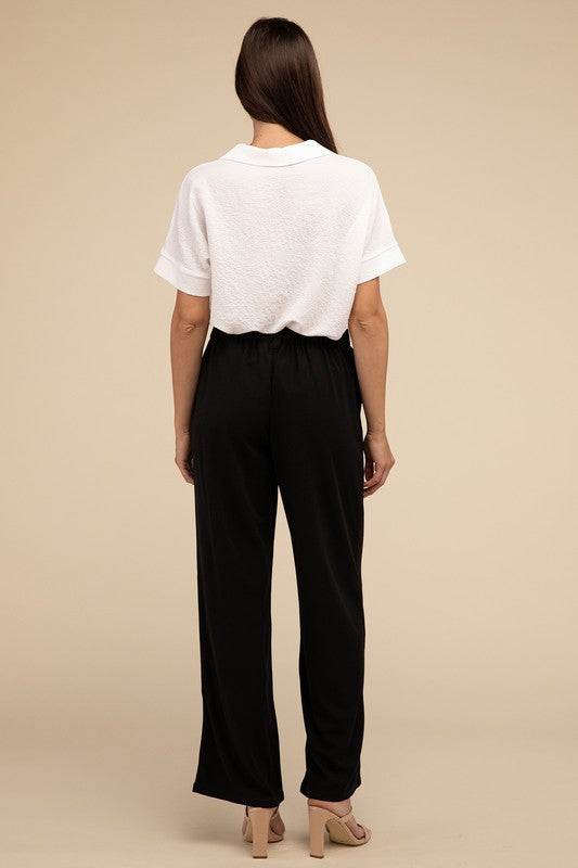 Waffle Trouser PantsElevate your everyday style with these waffle trouser pants. Crafted from textured waffle-knit fabric, they offer a perfect blend of comfort and sophistication. The