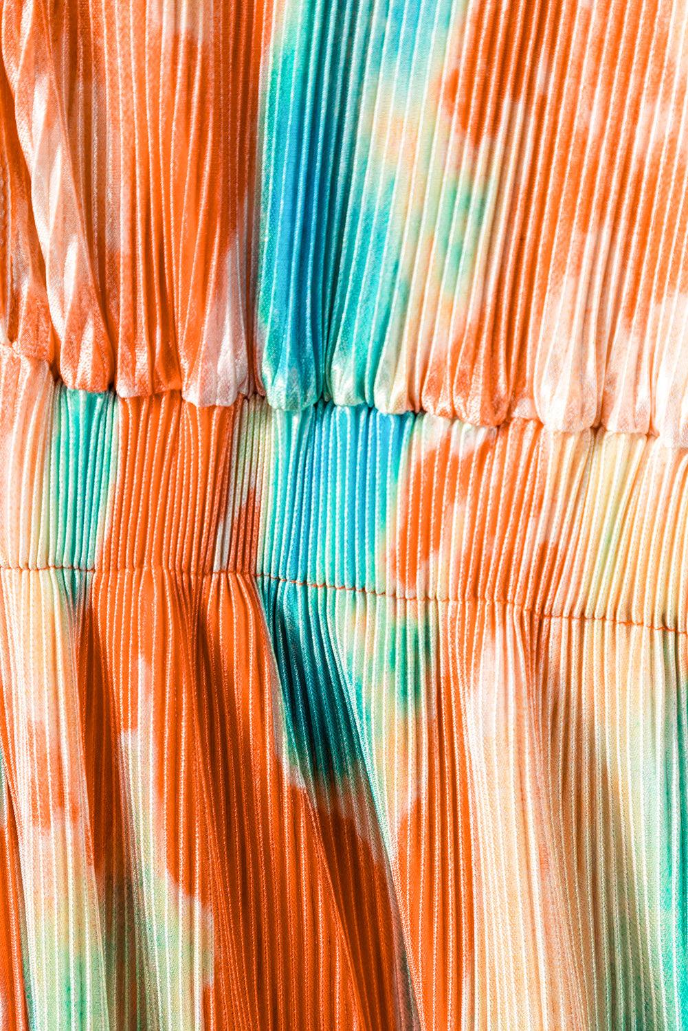 Multicolor Bohemian Tie Dye Pleated Wide Leg JumpsuitMaterial:100%Polyester
•Made of soft and flowy fabric for comfort and movement.
•Features a pleated design for a flattering fit.
•Wide leg c