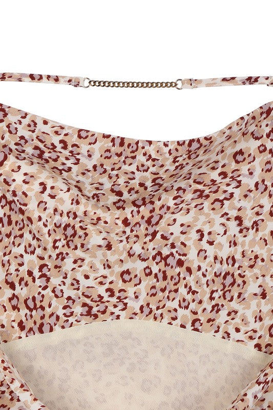 Leopard cami dress with chain trim- Leopard camisole cowl dress with gold chain trim at back strap- Pattern type : leopard- Sleeve length : sleeveless- Stretch : no stretch- Sheer : lined and not she