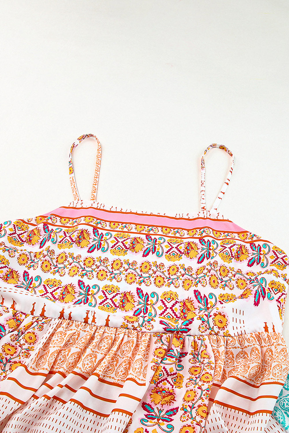 Multicolor Boho Patchwork Print Square Neck SundressMaterial:100%Polyester
Bohemian-inspired sundress with a colorful patchwork print and square neckline.
Flowy and comfortable midi dress with a loose