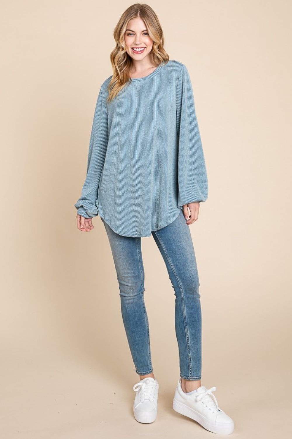 BOMBOM Long Sleeve Curved Hem Ribbed T-ShirtThe Long Sleeve Curved Hem Ribbed T-Shirt is a versatile and essential piece for your wardrobe. Its ribbed texture adds a unique touch to the classic design. The cur
