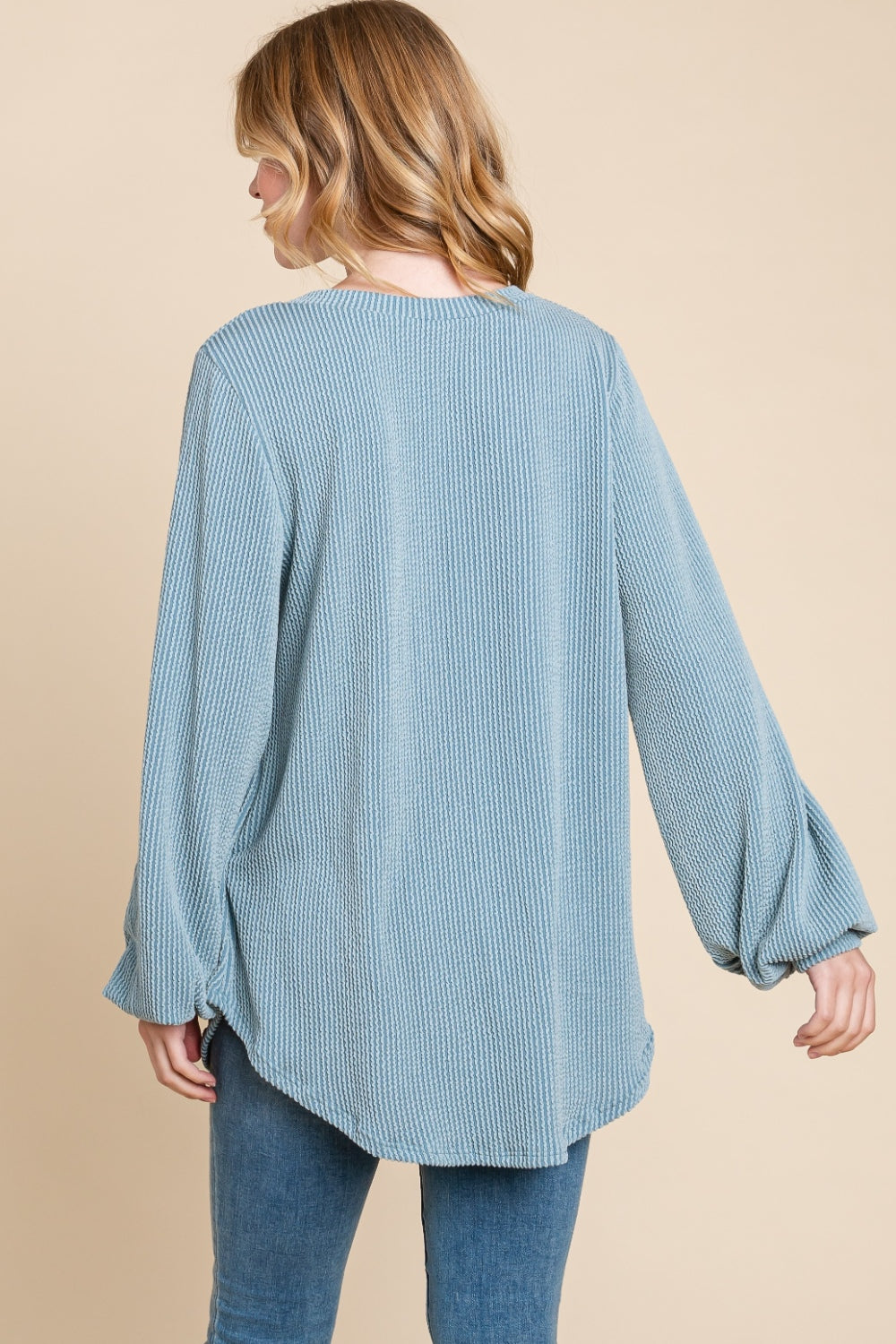 BOMBOM Long Sleeve Curved Hem Ribbed T-ShirtThe Long Sleeve Curved Hem Ribbed T-Shirt is a versatile and essential piece for your wardrobe. Its ribbed texture adds a unique touch to the classic design. The cur
