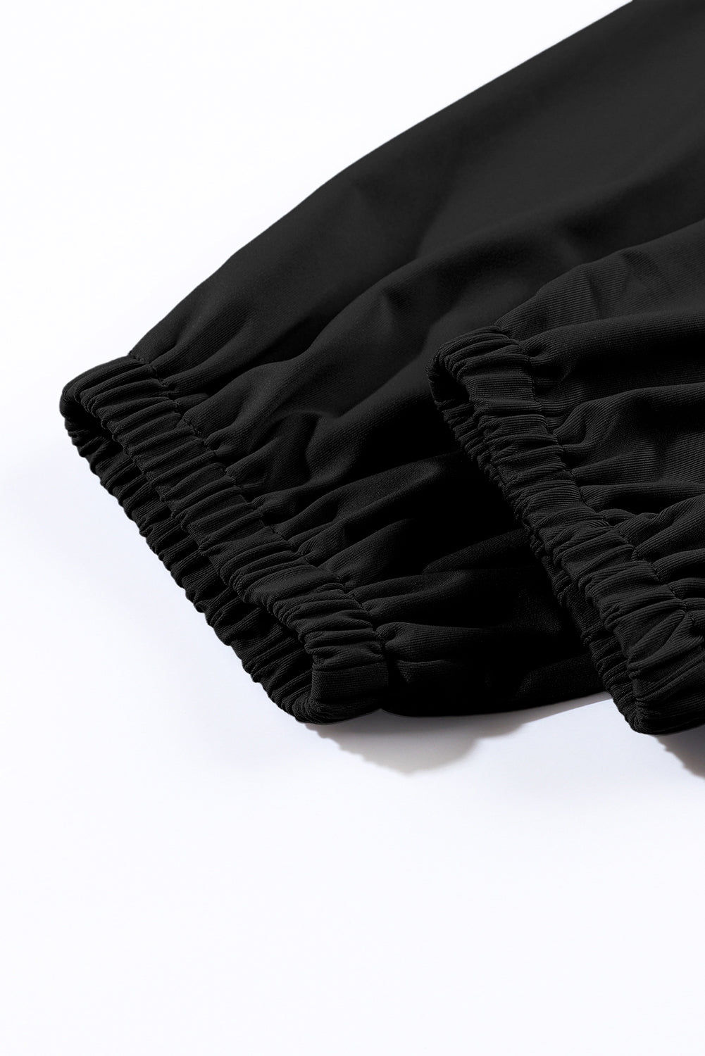 Black Pocketed Smocked High Waist JoggersMaterial:95%Polyester+5%Elastane
These jogger pants are very cozy to wear with 95%Polyester+5%Elastane made
The smocked design adds a stylish touch a