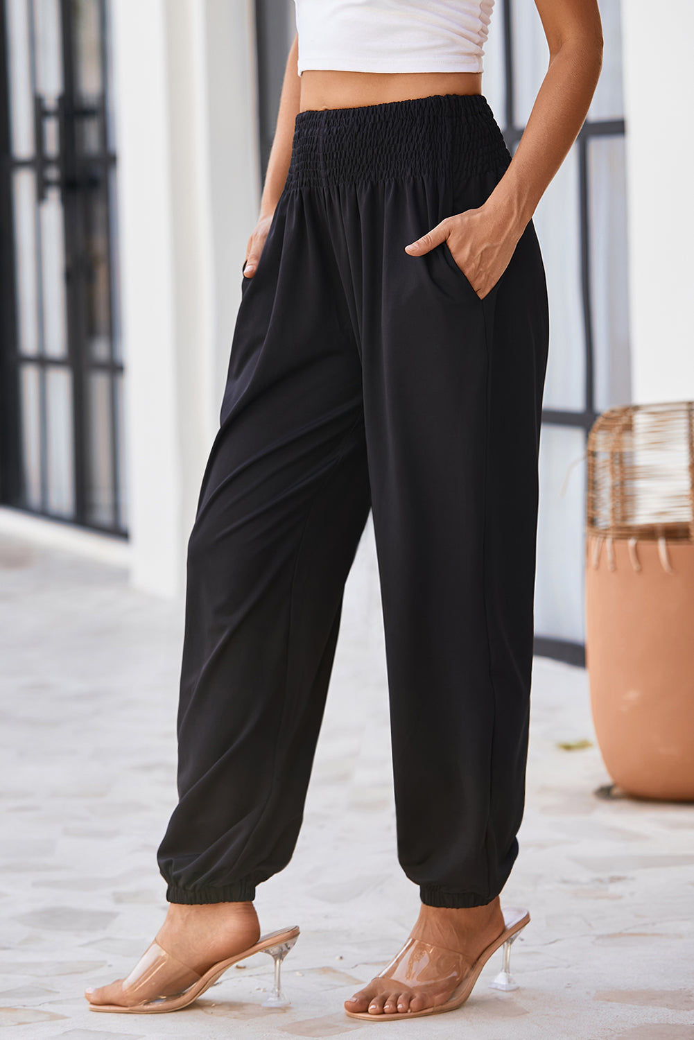Black Pocketed Smocked High Waist JoggersMaterial:95%Polyester+5%Elastane
These jogger pants are very cozy to wear with 95%Polyester+5%Elastane made
The smocked design adds a stylish touch a