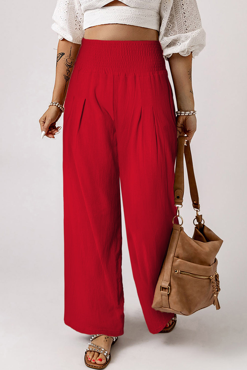 Black Smocked Wide Waistband High Waist Wide Leg PantsMaterial:65%COTTON+35%POLYESTER
Flattering smocked waistband cinches at the
waist for a lovely silhouette
High waist design elongates legs for a
st