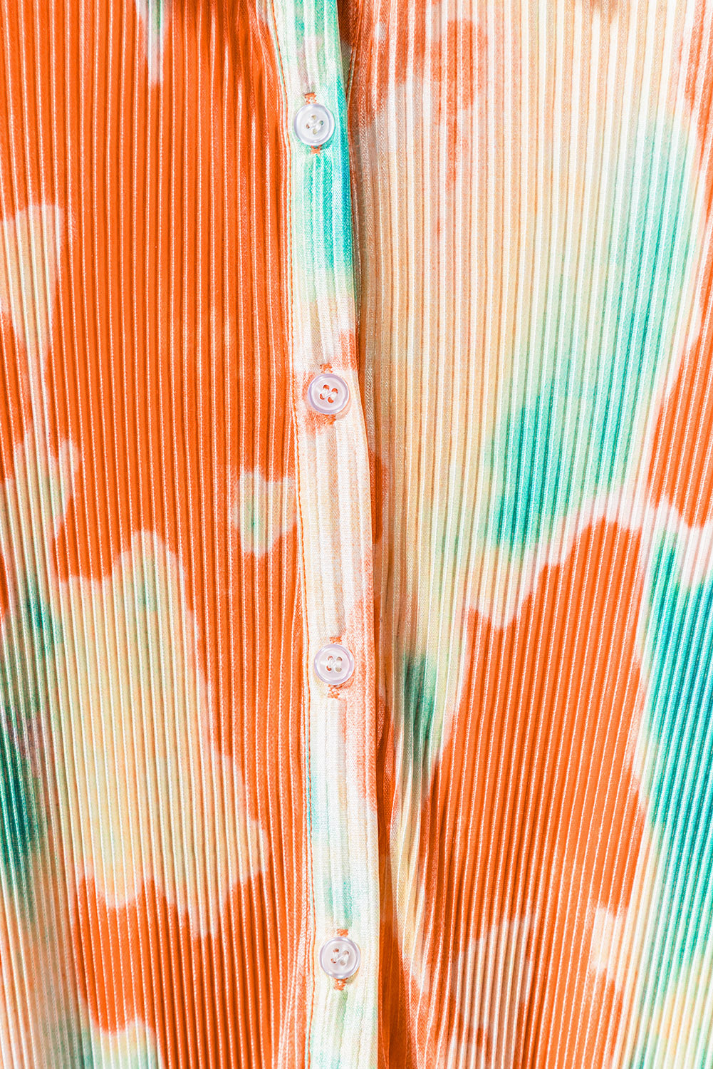 Multicolor Bohemian Tie Dye Pleated Wide Leg JumpsuitMaterial:100%Polyester
•Made of soft and flowy fabric for comfort and movement.
•Features a pleated design for a flattering fit.
•Wide leg c
