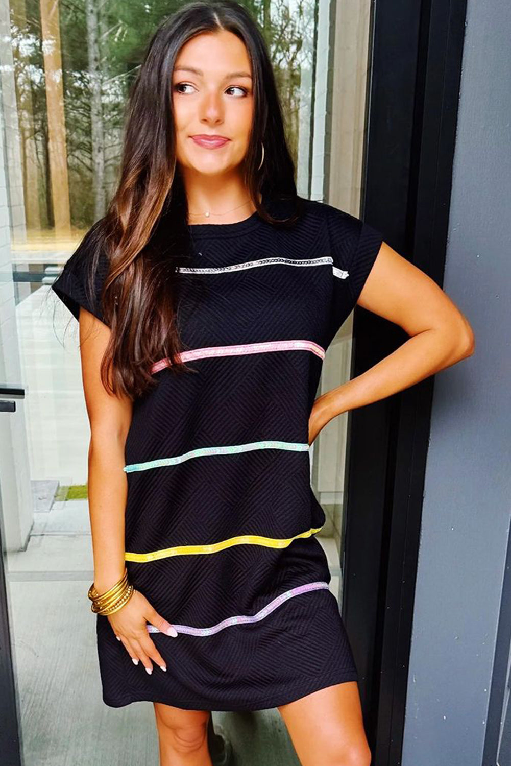 Black Sequin Striped Cap Sleeve Textured Mini DressMaterial:97%Polyester+3%Elastane
The mini dress is a stylish piece featuring sequin embellishments and striped details, adding a touch of glamour to your look