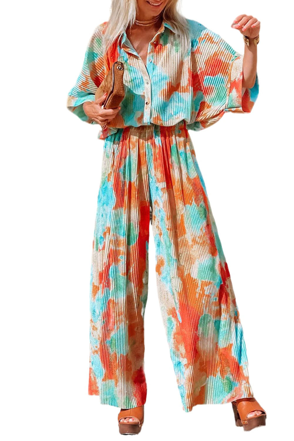 Multicolor Bohemian Tie Dye Pleated Wide Leg JumpsuitMaterial:100%Polyester
•Made of soft and flowy fabric for comfort and movement.
•Features a pleated design for a flattering fit.
•Wide leg c
