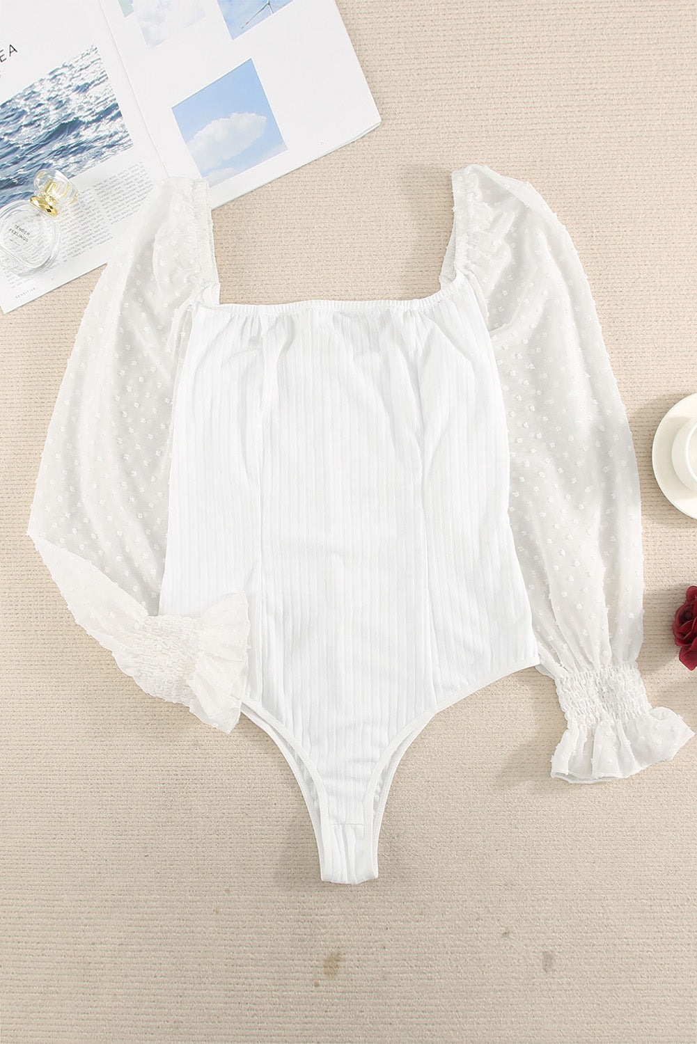White Casual Solid Swiss Dot Ribbed Puff Sleeve BodysuitMaterial:95%Polyester+5%Elastane
Look super sweet for date night in our swiss dot bodysuit
This ribbed knit bodysuit features contrasted swiss dot bi