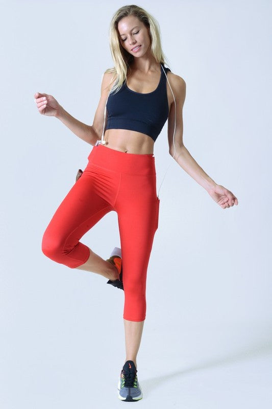 High Waist Tech Pocket Workout Capri LeggingsBetter than ever: Moisture wick performance fabric with 4-way stretch meets a new waistband that slims and stays in place! Three convenient pockets hold your phone,