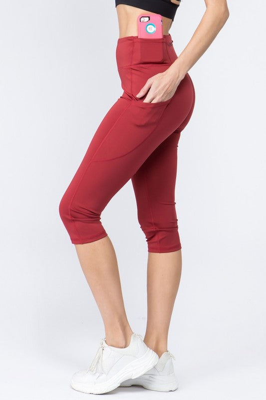 High Waist Tech Pocket Workout Capri LeggingsBetter than ever: Moisture wick performance fabric with 4-way stretch meets a new waistband that slims and stays in place! Three convenient pockets hold your phone,