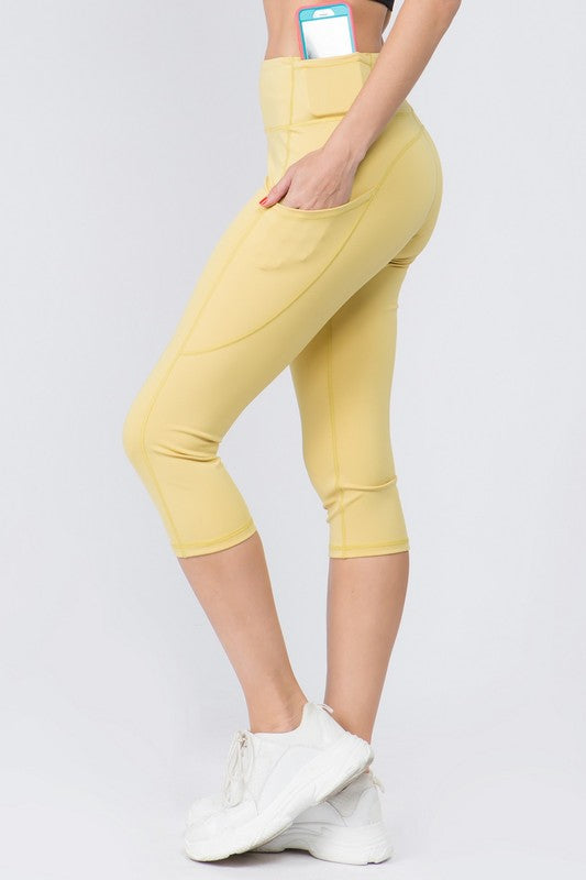 High Waist Tech Pocket Workout Capri LeggingsBetter than ever: Moisture wick performance fabric with 4-way stretch meets a new waistband that slims and stays in place! Three convenient pockets hold your phone,