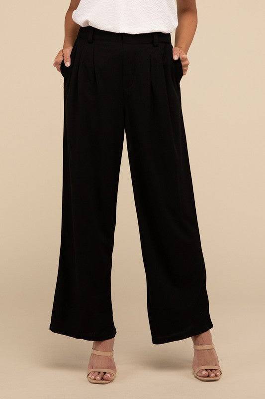 Waffle Trouser PantsElevate your everyday style with these waffle trouser pants. Crafted from textured waffle-knit fabric, they offer a perfect blend of comfort and sophistication. The