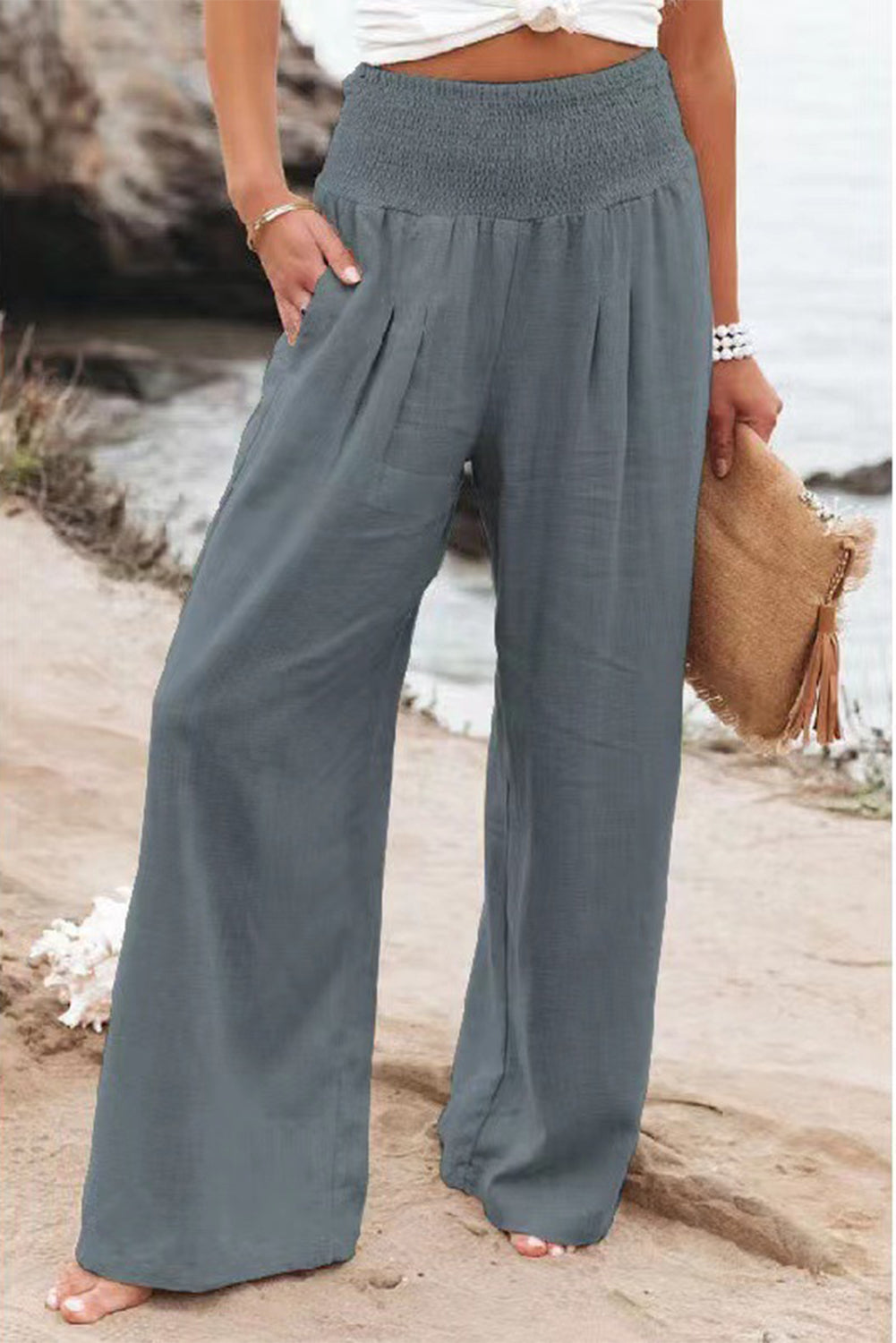 Black Smocked Wide Waistband High Waist Wide Leg PantsMaterial:65%COTTON+35%POLYESTER
Flattering smocked waistband cinches at the
waist for a lovely silhouette
High waist design elongates legs for a
st