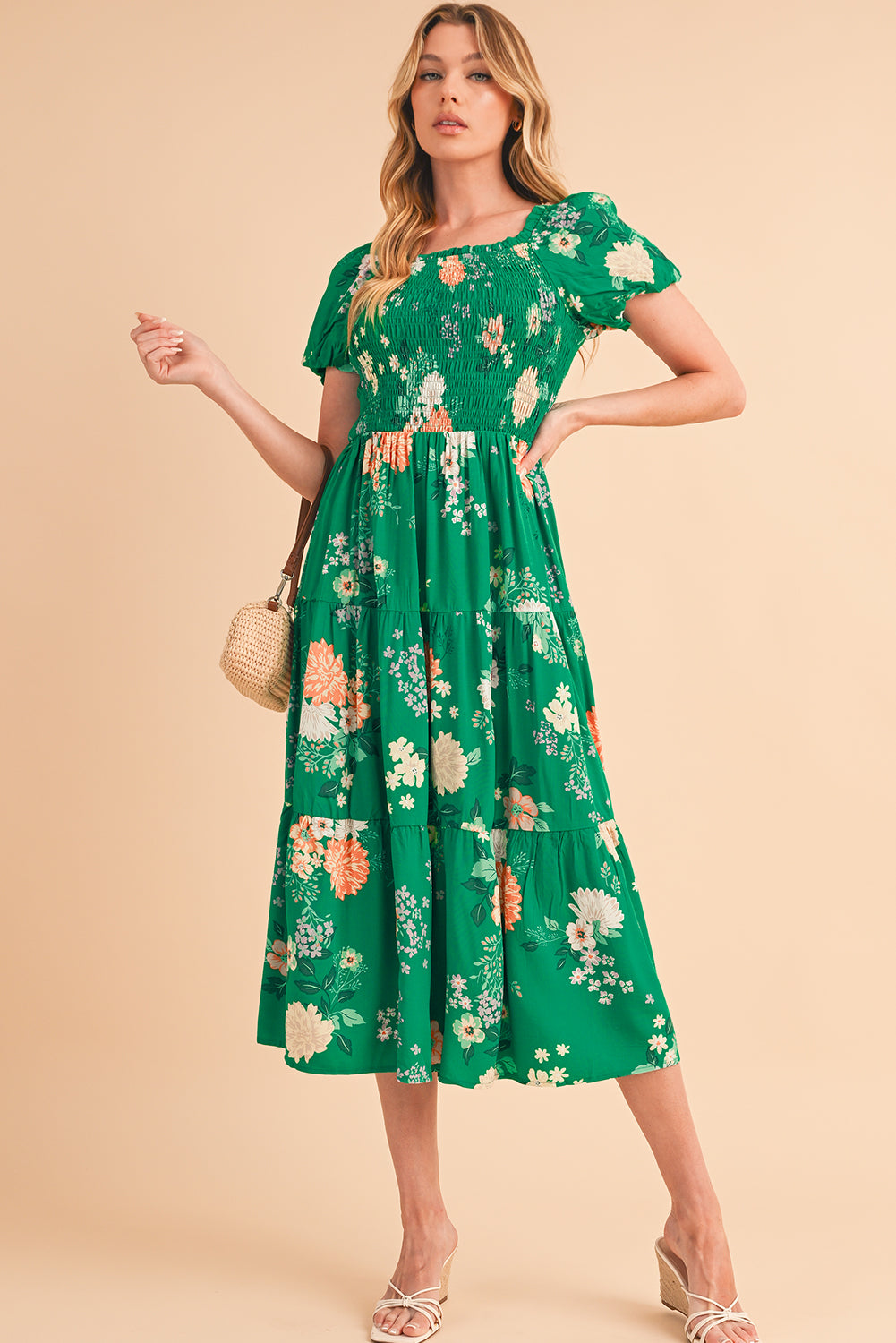 Green Floral Print Bubble Sleeve Smocked Tiered Midi DressMaterial:100%Viscose
This chic dress adds a vibrant and feminine touch, creating a romantic look
The smocked panel provides a fitted and flattering w