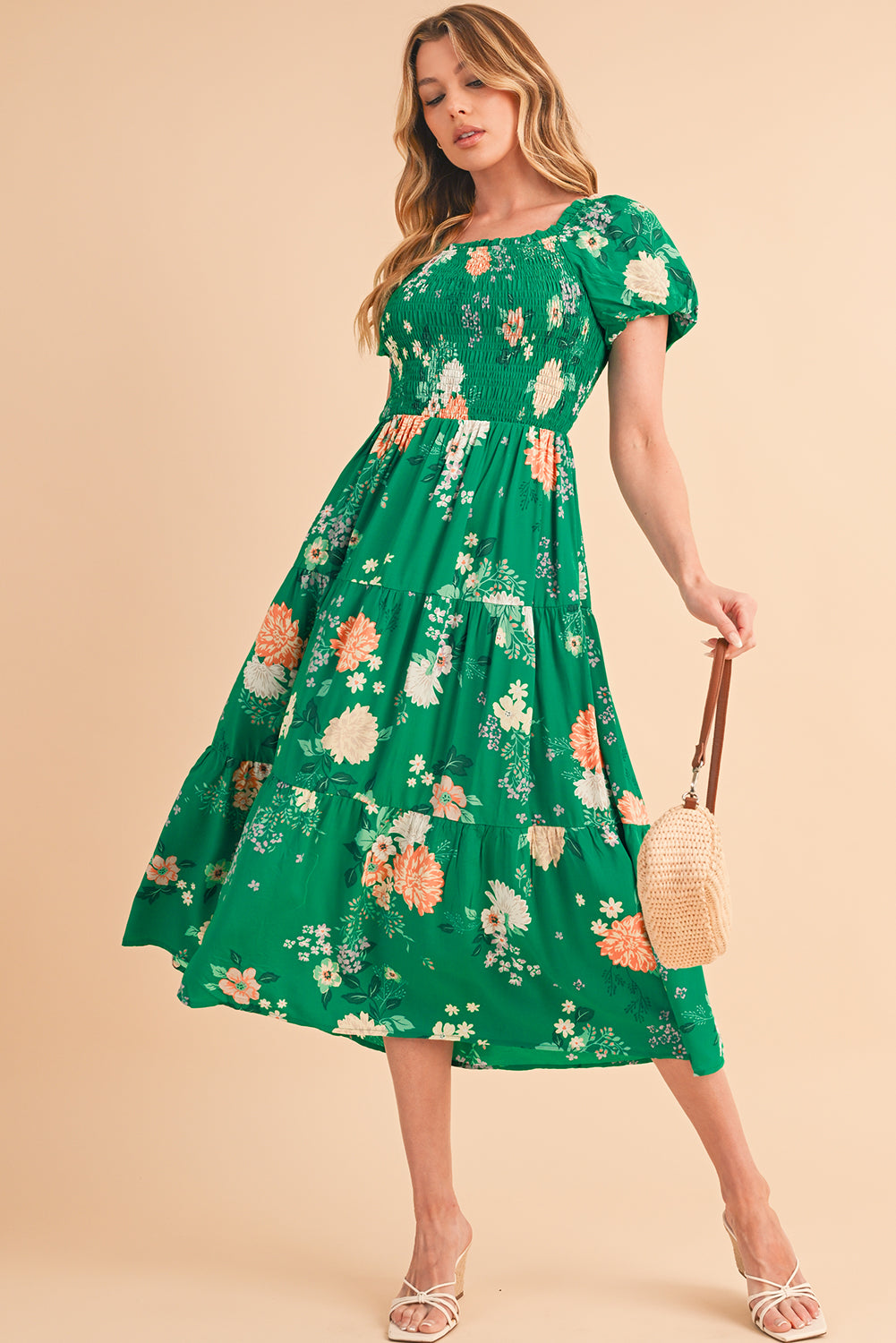 Green Floral Print Bubble Sleeve Smocked Tiered Midi DressMaterial:100%Viscose
This chic dress adds a vibrant and feminine touch, creating a romantic look
The smocked panel provides a fitted and flattering w