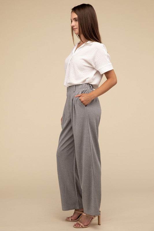 Waffle Trouser PantsElevate your everyday style with these waffle trouser pants. Crafted from textured waffle-knit fabric, they offer a perfect blend of comfort and sophistication. The