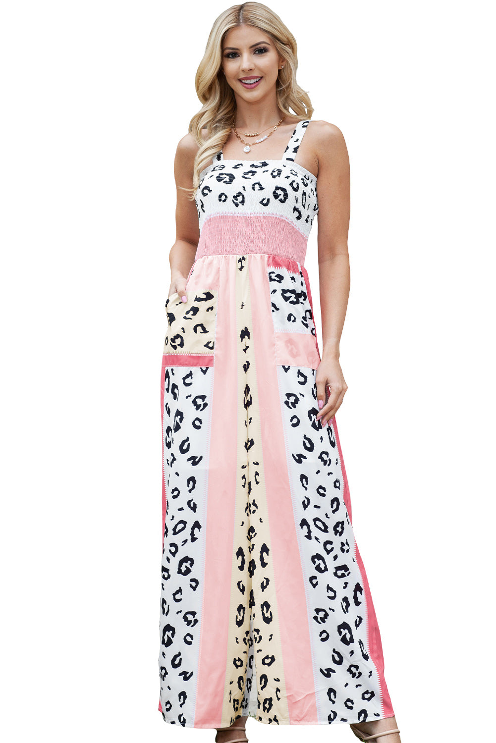Pink Leopard Color Block Patchwork Strap JumpsuitMaterial:100%Polyester
The pink leopard color block mix print design creates a trendy and playful look, perfect for making a fashion statement.
The